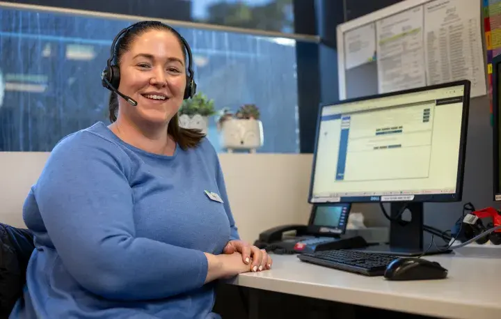 Western health staff member smiling