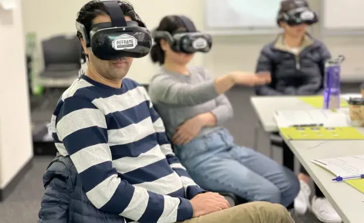 People wearing Virtual Reality headsets in OVA training